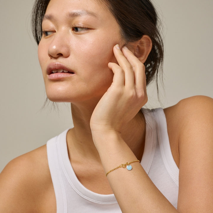Enamel Copenhagen Ball Chain Icy Blue Gold Bracelet. Item code B16G_69_IcyBlue.