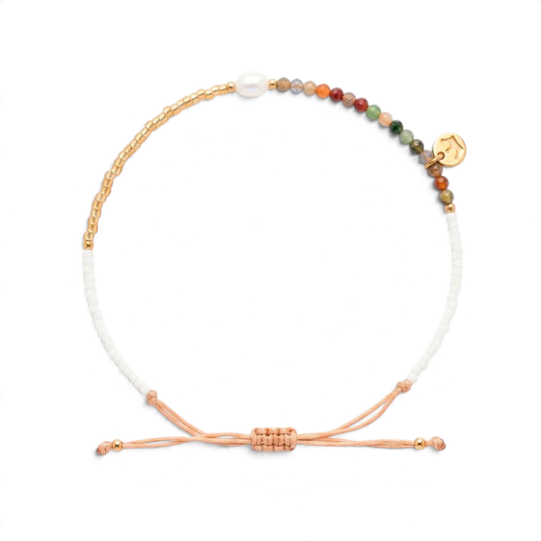 Niche Jewellery Jersey Pearl Noma bracelet featuring India agate stones, a freshwater pearl, and gold-tone beads.