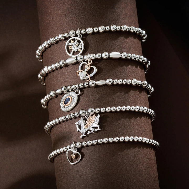 Niche Jewellery: Clogau Sterling silver beaded bracelet with rose gold Tree of Life charm, symbolizing growth and connection.