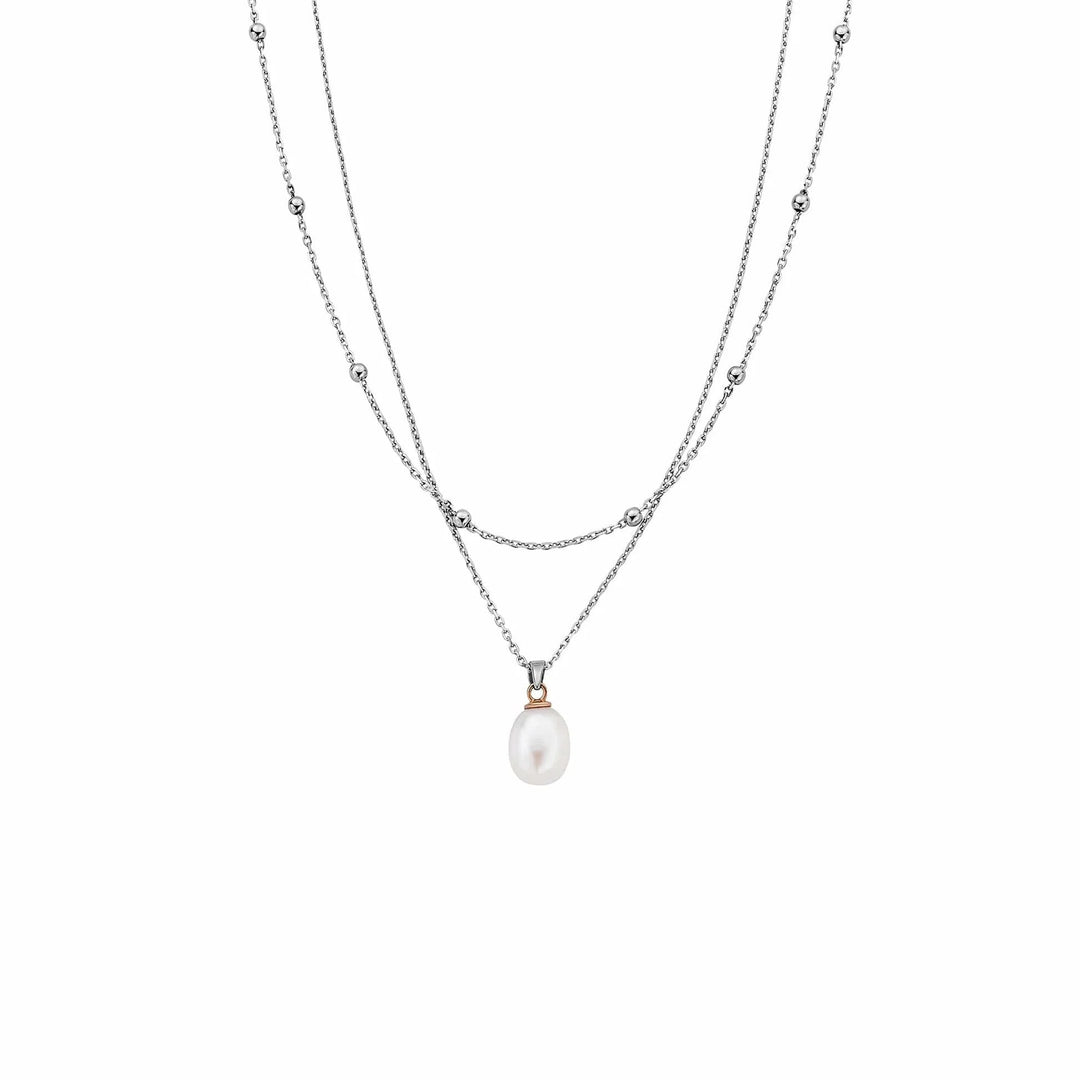 Niche Jewellery: Clogau sterling silver layered necklace with a single pearl pendant and small silver beads on the chains.