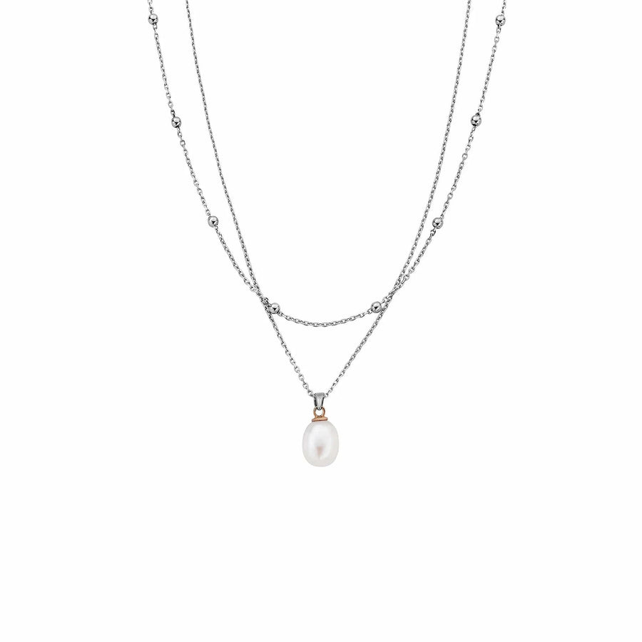 Niche Jewellery: Clogau sterling silver layered necklace with a single pearl pendant and small silver beads on the chains.