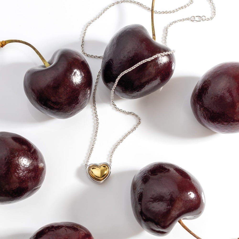 Niche Jewellery Kit Heath Heart of Gold necklace with a gold heart pendant on a sterling silver chain.
