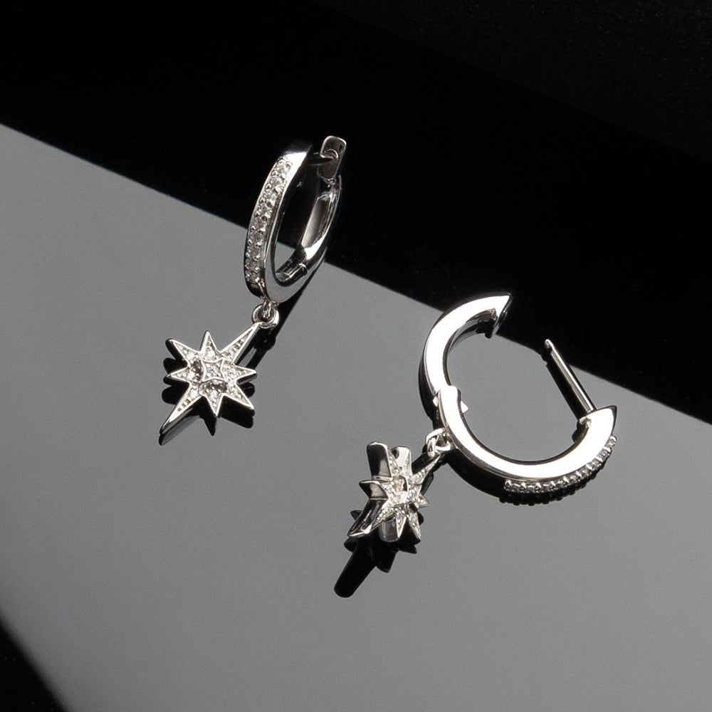 Niche Jewellery Céleste North Star Hoop Earrings with cubic zirconia pavé detail and star pendant.