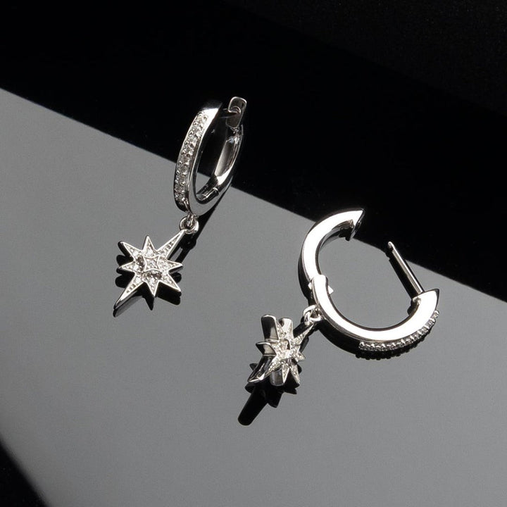 Niche Jewellery Céleste North Star Hoop Earrings with cubic zirconia pavé detail and star pendant.