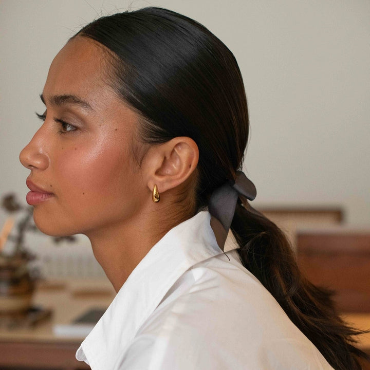 D.Louise Curved Mini Gold Hoop Earrings close up