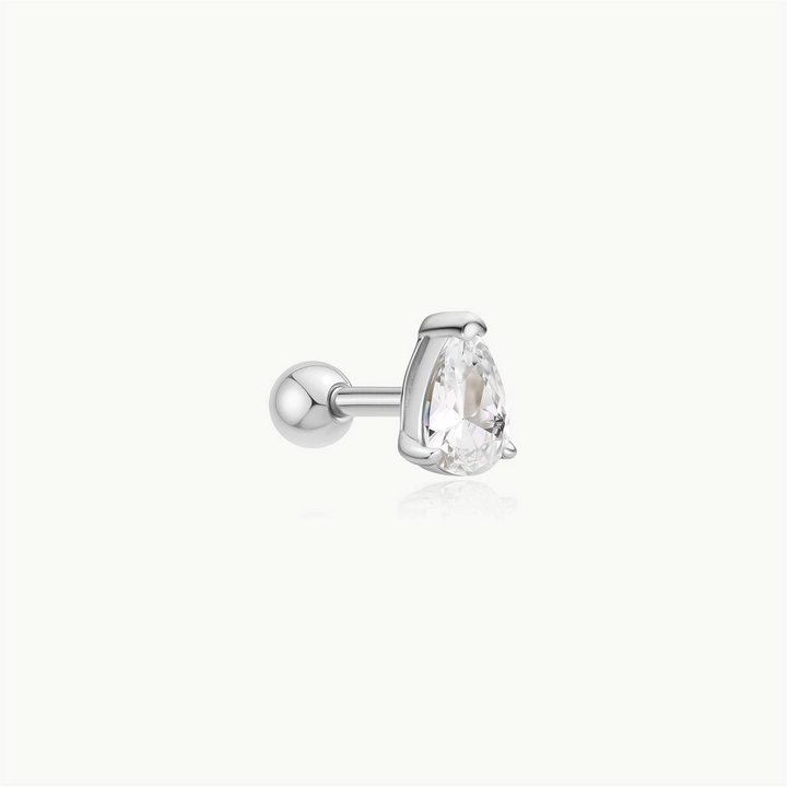 Niche Jewellery Ania Haie silver pear-shaped barbell earring with a clear stone, minimalist style.
