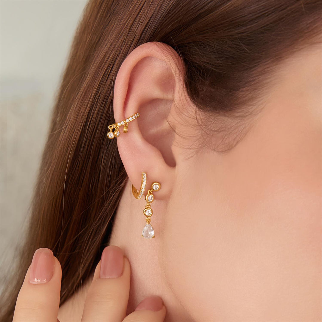 Niche Jewellery Ania Haie Molten Cascade Bezel-Set Teardrop Stud Gold Earrings worn on model