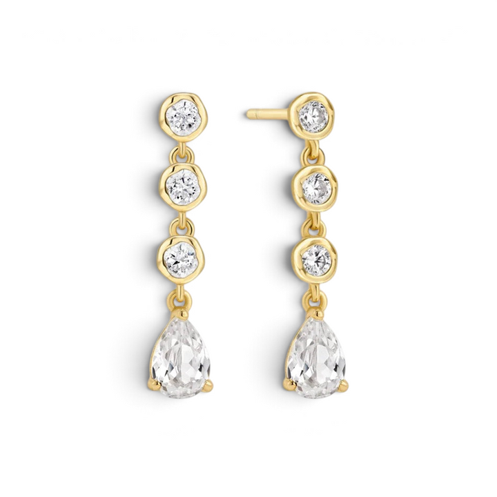 Niche Jewellery Ania Haie gold stud earrings featuring bezel-set round and teardrop crystals in a molten design.