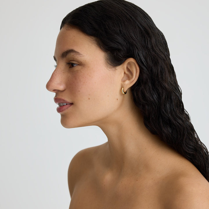 D.Louise Wave Gold Huggie Hoop Earrings detail view