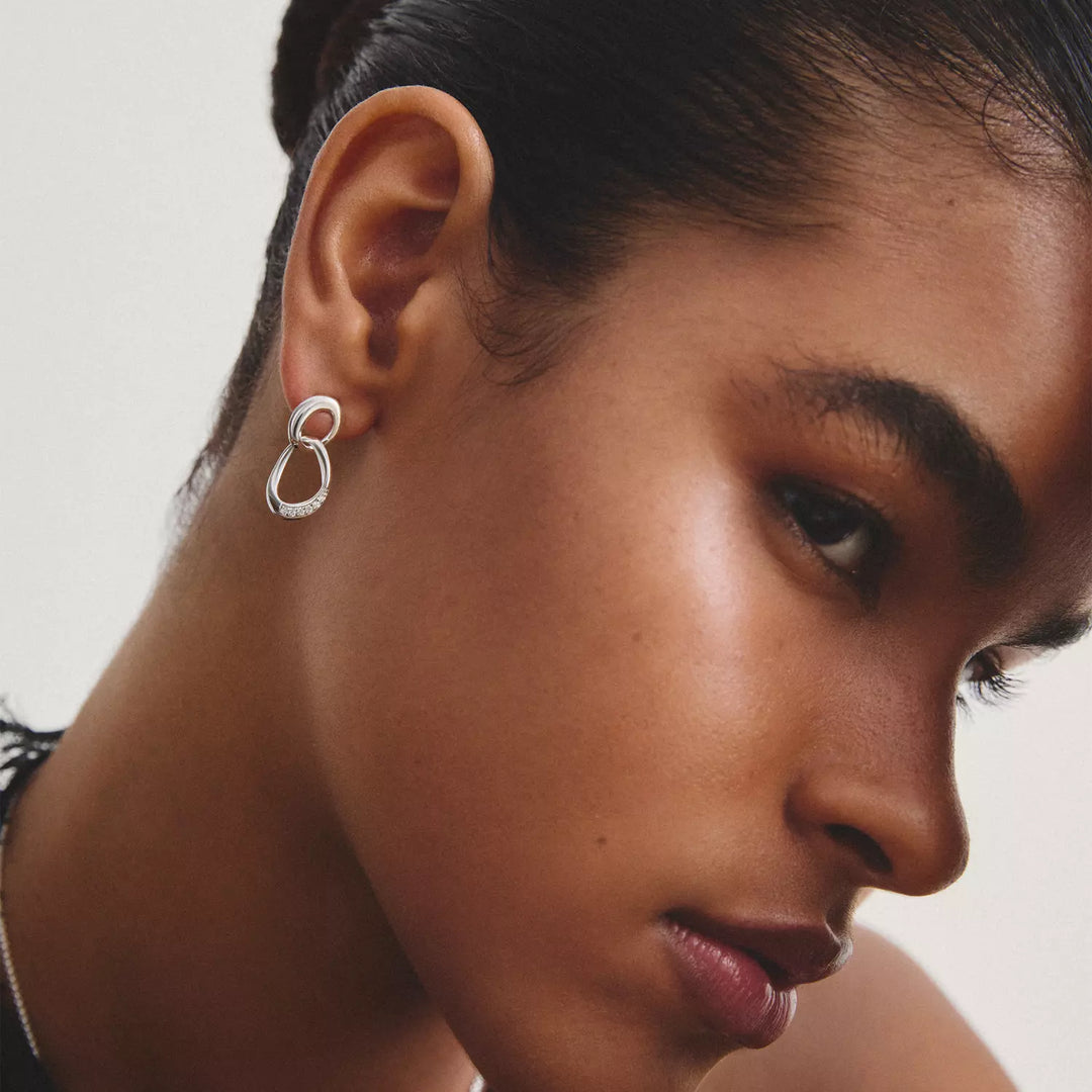 Niche Jewellery Thomas Sabo Together Silver Earrings with White Zirconia worn on model