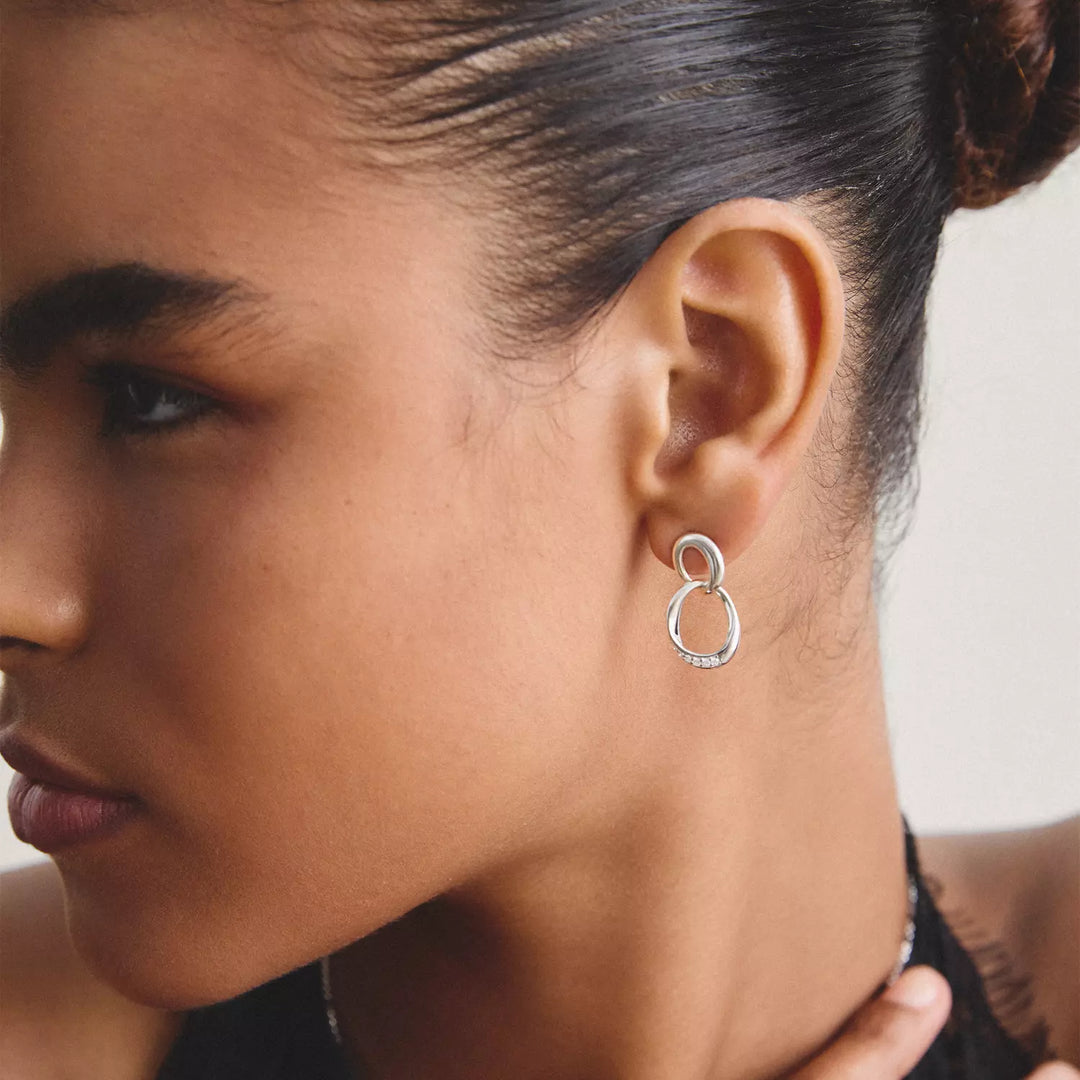 Niche Jewellery Thomas Sabo Together Silver Earrings with White Zirconia worn on model