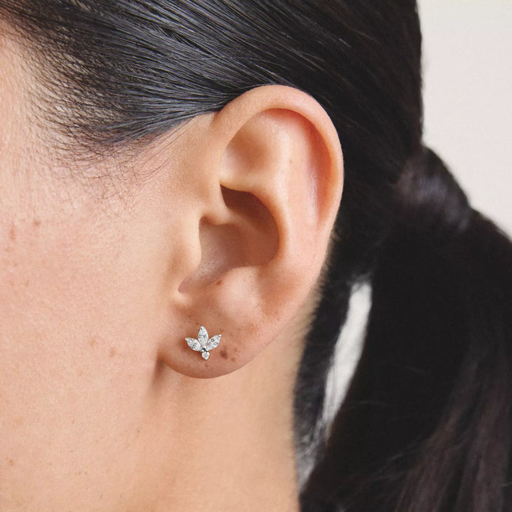 Niche Jewellery Thomas Sabo Flower Stud Earrings Silver with White Teardrop Zirconia worn on model
