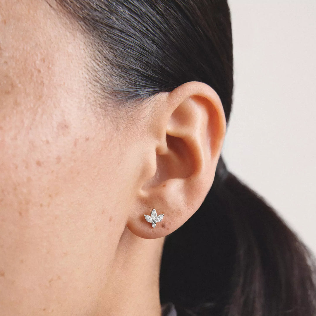 Niche Jewellery Thomas Sabo Flower Stud Earrings Silver with White Teardrop Zirconia worn on model