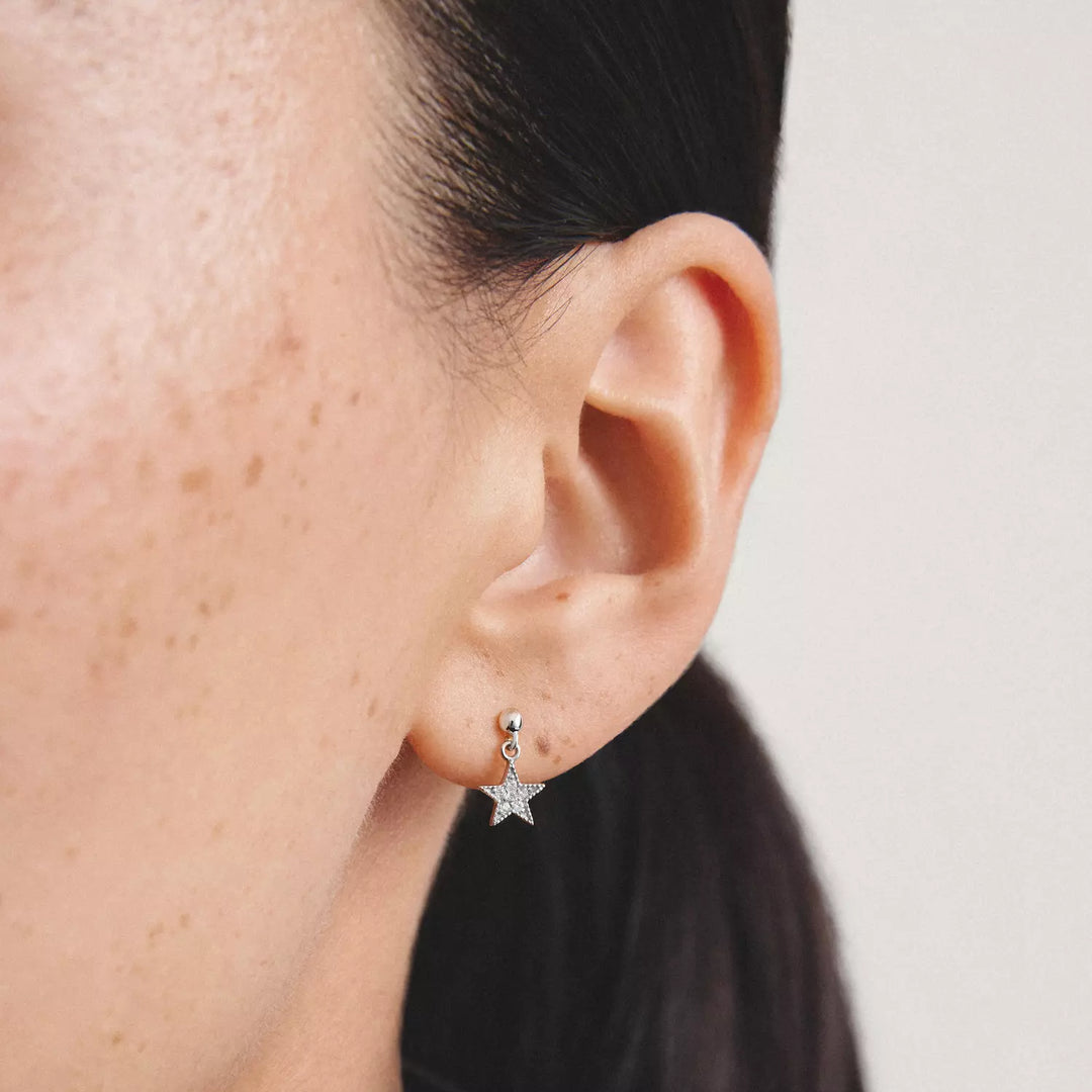 Niche Jewellery Thomas Sabo Moon and Star Stud Earrings Silver with White Zirconia worn on model