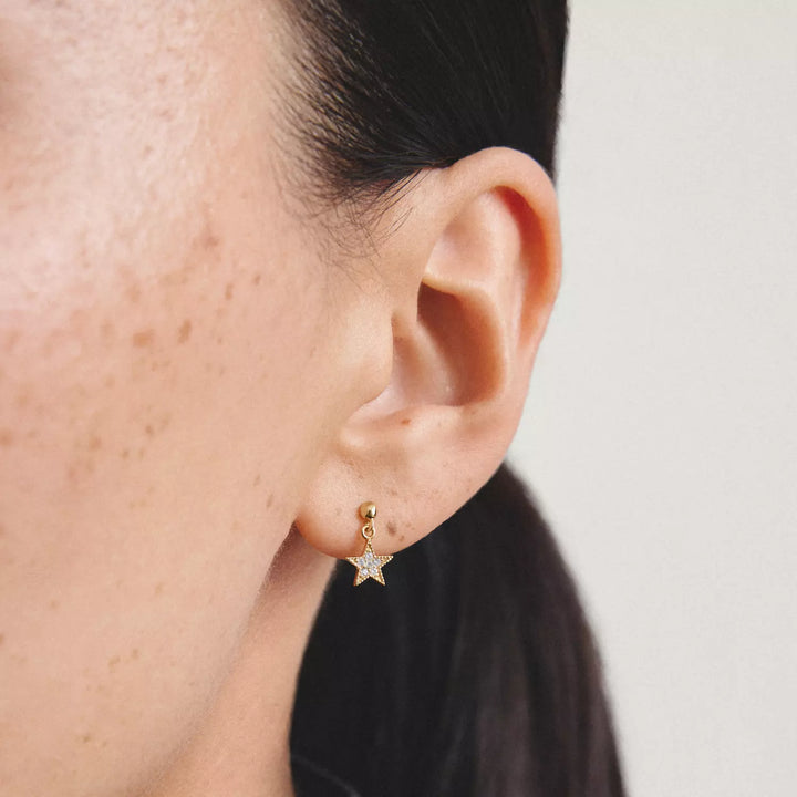 Niche Jewellery Thomas Sabo Moon and Star Stud Earrings Gold with White Zirconia worn on model