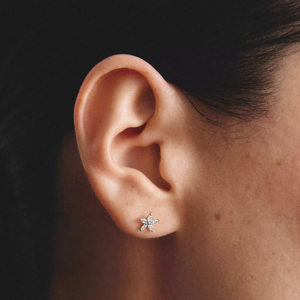Niche Jewellery Thomas Sabo Flower Stud Earrings Silver with White Zirconia worn on model