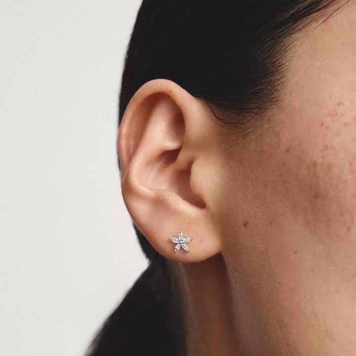 Niche Jewellery Thomas Sabo Flower Stud Earrings Silver with White Zirconia worn on model