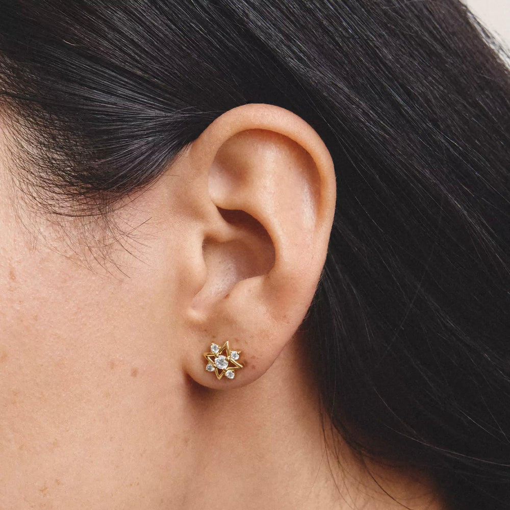 Niche Jewellery Thomas Sabo Star Stud Earrings Gold with White Zirconia worn on model