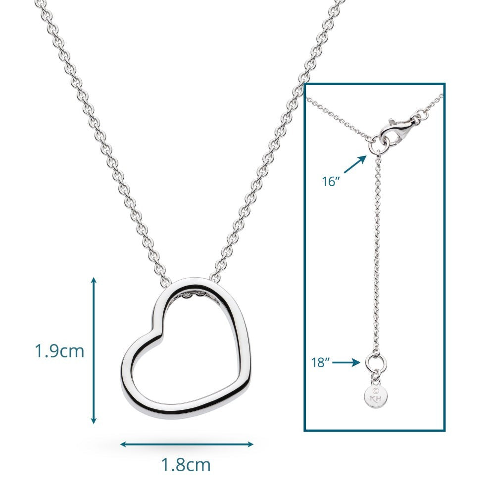 Niche Jewellery: Kit Heath sterling silver necklace with a delicate heart outline pendant that sits at a subtle angle.