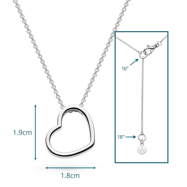 Niche Jewellery: Kit Heath sterling silver necklace with a delicate heart outline pendant that sits at a subtle angle.