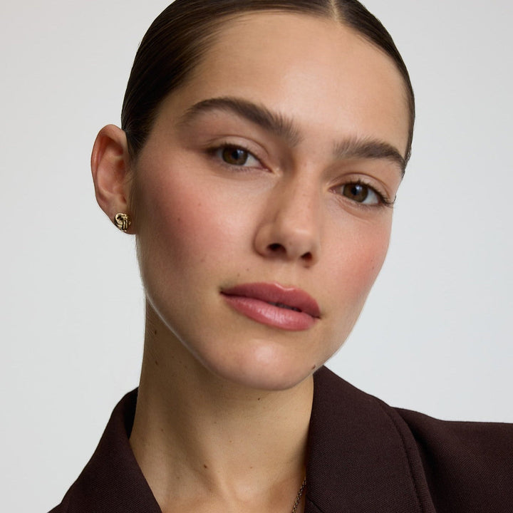 D.Louise Knots Gold Stud Earrings close up
