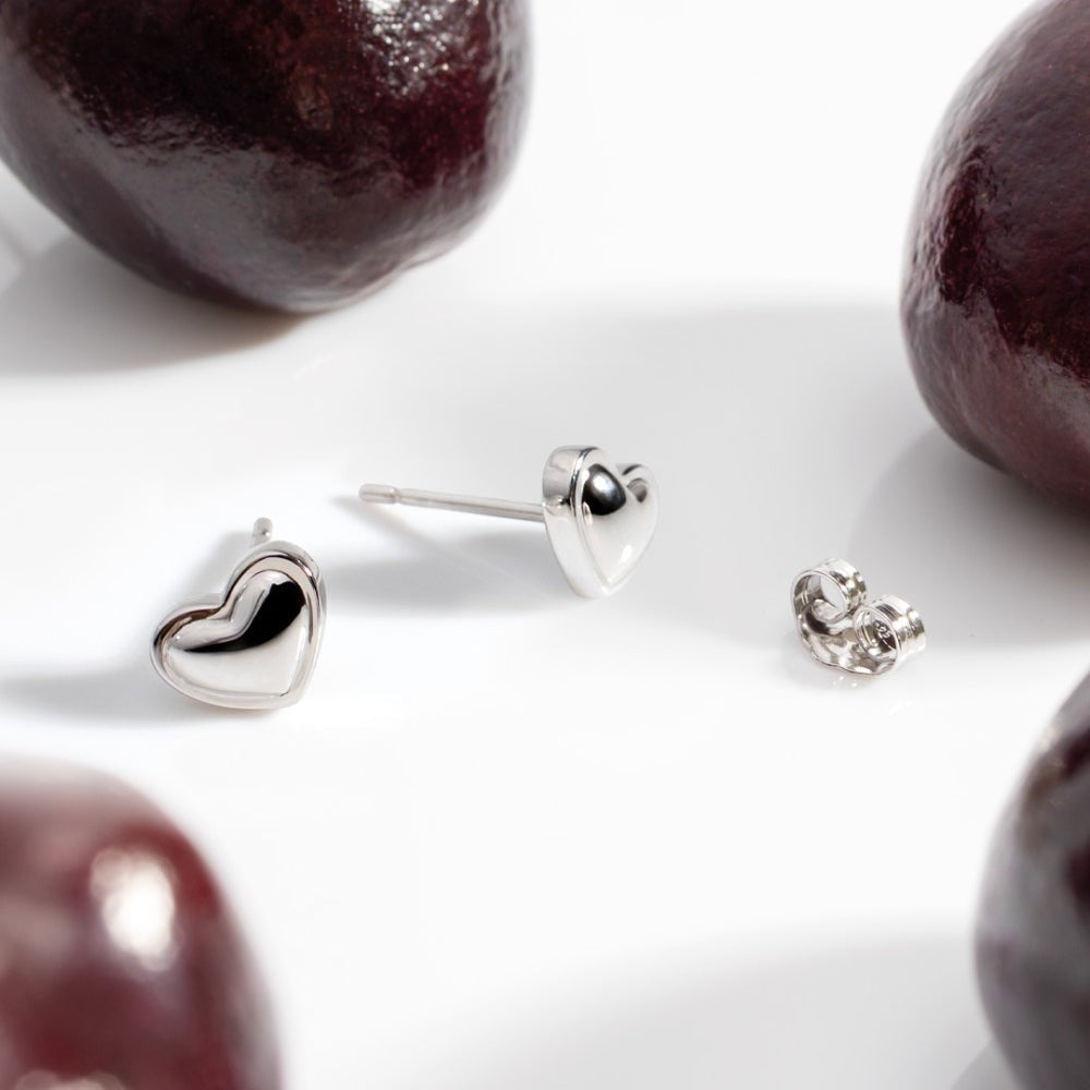 Kit Heath Love Silver Heart Stud Earrings - Sterling silver, polished finish, heart shape, stud backing. Simple and refined.