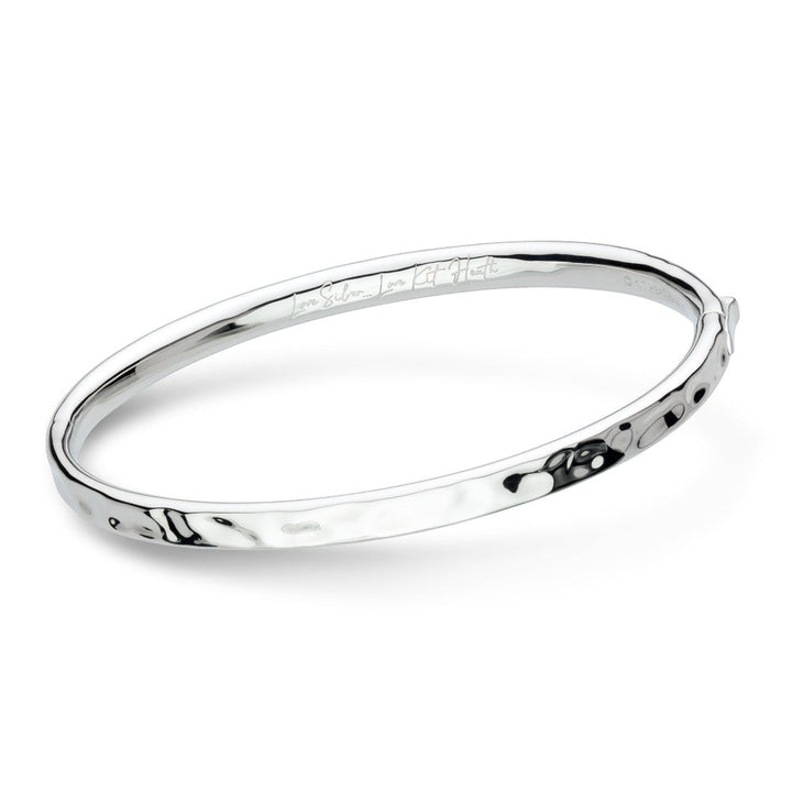 Niche Jewellery Kit Heath Mirage Reflect Hinged Bangle in Sterling Silver with hammered texture and engraved detail.