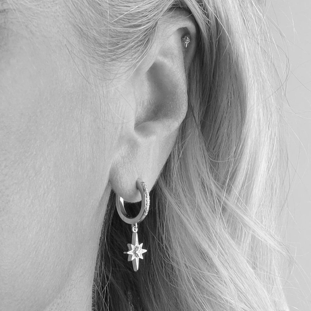 Niche Jewellery Céleste North Star Hoop Earrings with cubic zirconia detail and star pendant.