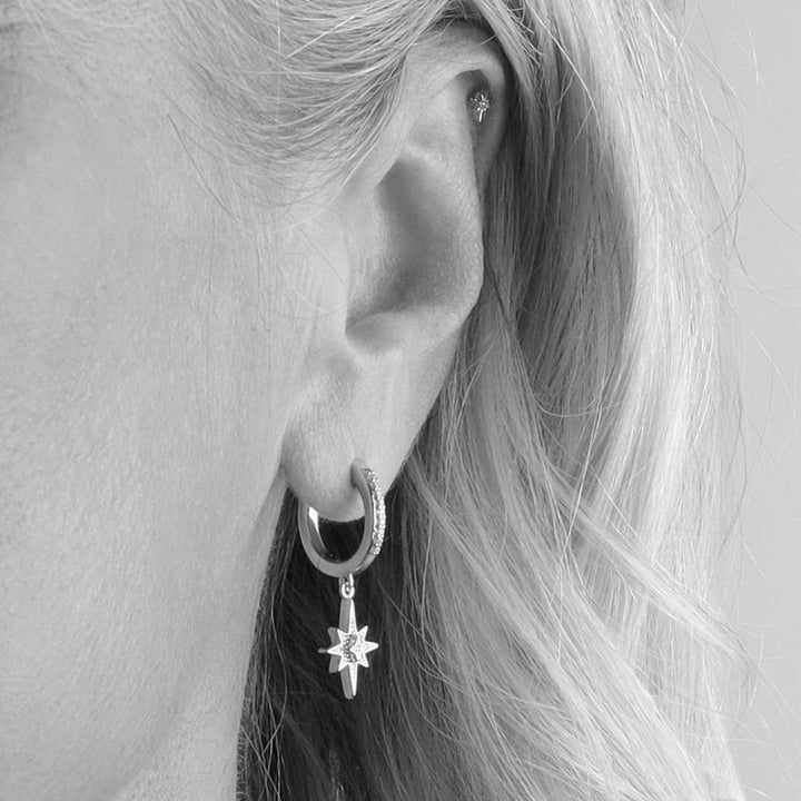 Niche Jewellery Céleste North Star Hoop Earrings with cubic zirconia detail and star pendant.
