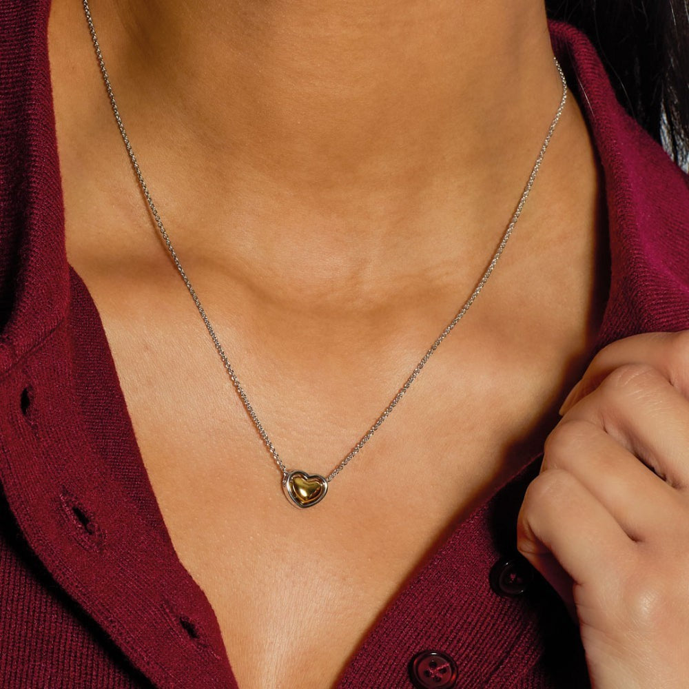 Niche Jewellery Kit Heath Heart of Gold necklace with a gold heart pendant on a sterling silver chain.
