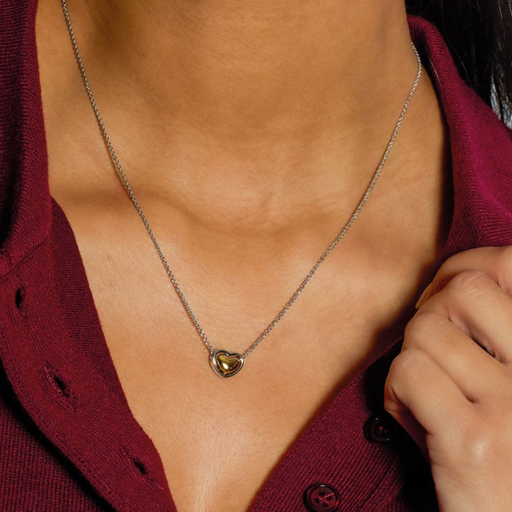 Niche Jewellery Kit Heath Heart of Gold necklace with a gold heart pendant on a sterling silver chain.