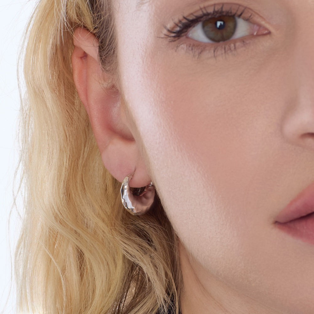 Niche Jewellery Kit Heath Mirage Reflect sterling silver hinged hoop earrings with dappled texture.