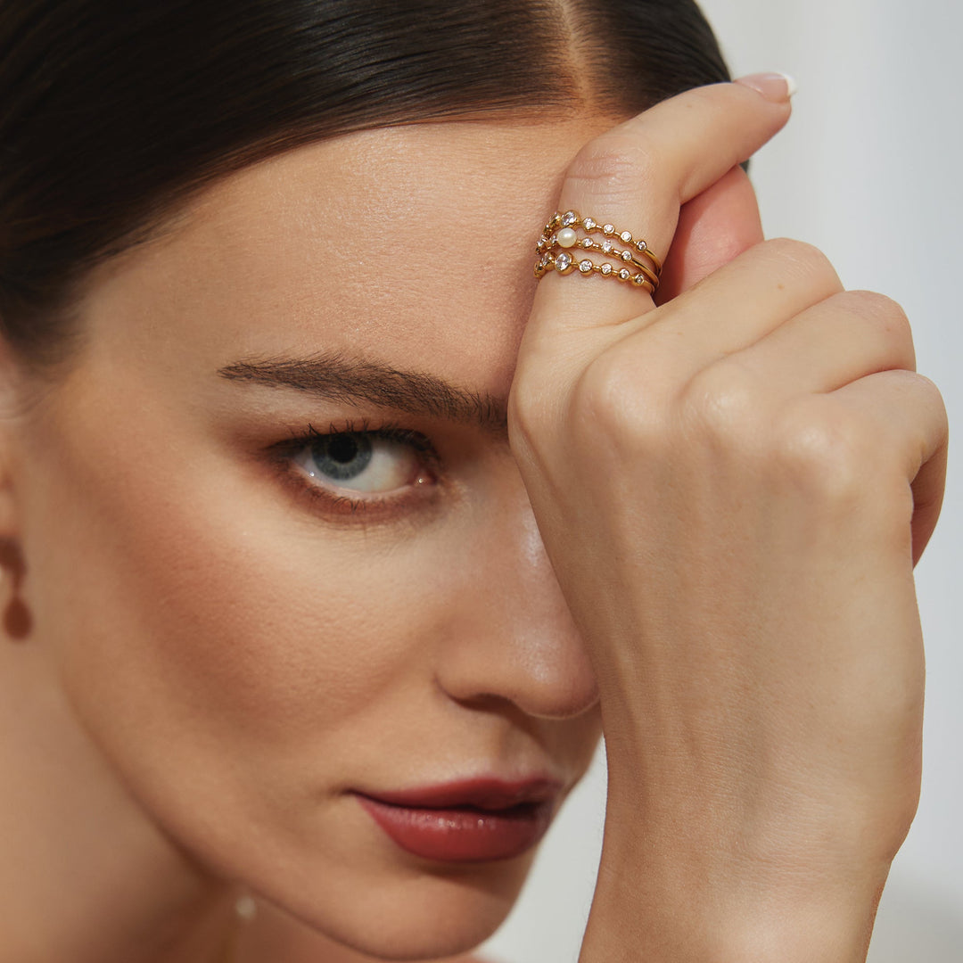 Niche Jewellery Ania Haie Gold Bezel Cubic Zirconia Zig-Zag Ring worn on model
