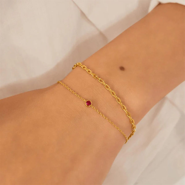 Ania Haie Crimson Solitaire Gold Bracelet. Item code B071-01G.