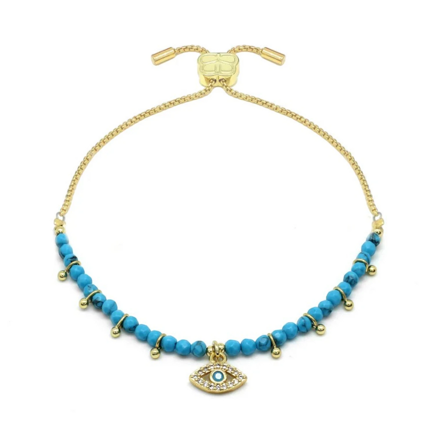 Niche Jewellery Boho Betty Brela blue beaded bracelet with evil eye charm and gold accents. Adjustable slider.