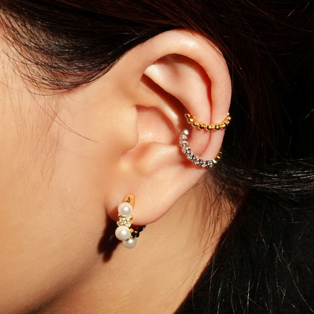Ania Haie Sparkling Braided Shell Pearl Gold Huggie Hoop Earrings. Item code E069-07G.