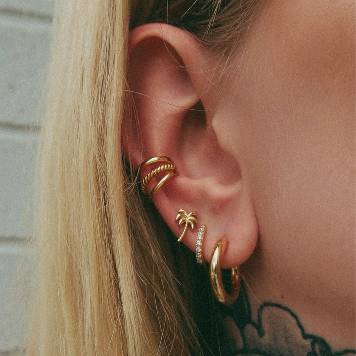 Niche Jewellery Scream Pretty Huggie Earrings with Clear Stones - Gold detail