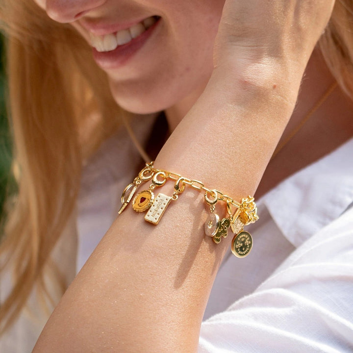 Lily Charmed Chunky Oval Link Charm Gold Bracelet. Item code CBRGCNKOV