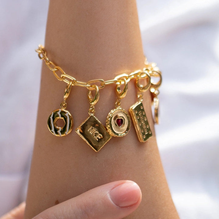 Lily Charmed Chunky Oval Link Charm Gold Bracelet. Item code CBRGCNKOV