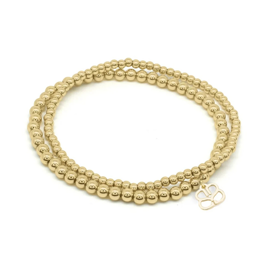 Niche Jewellery Boho Betty Kamini gold stretch bead bracelet set with 3mm and 4mm beads and a charm.