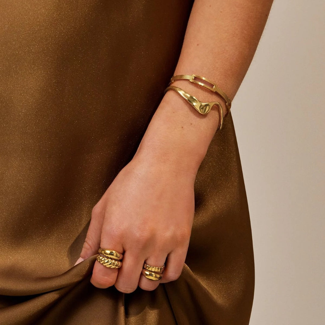 Katie Loxton Marina Waterproof Gold Wave Bangle KLJ6333