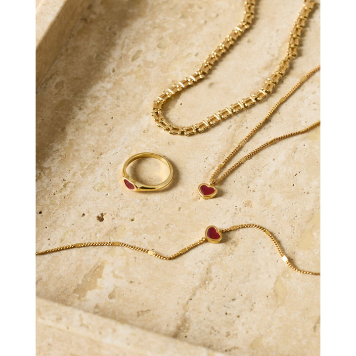 Katie Loxton Rouge Waterproof Gold Heart Bracelet. Item code KLJ6436.