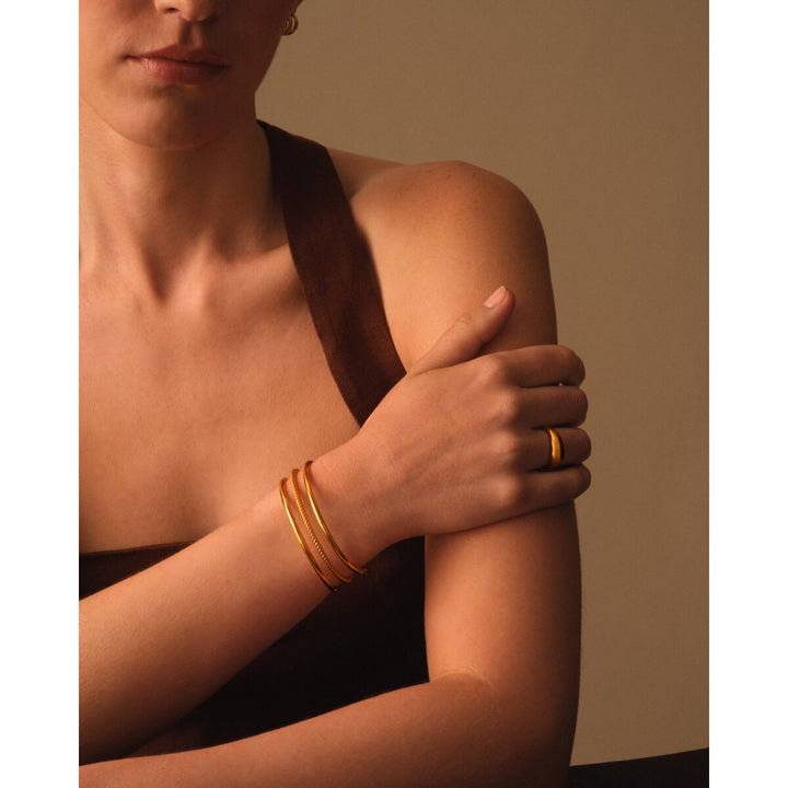 Katie Loxton Laia Waterproof Gold Bangle. Item code KLJ6461.