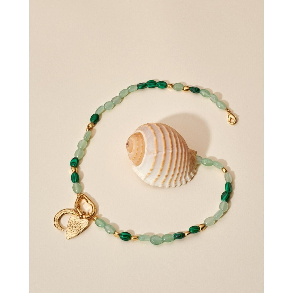 Niche Jewellery Katie Loxton Palma Solesi gold bracelet with green beads, crescent moon and evil eye charms. Waterproof.