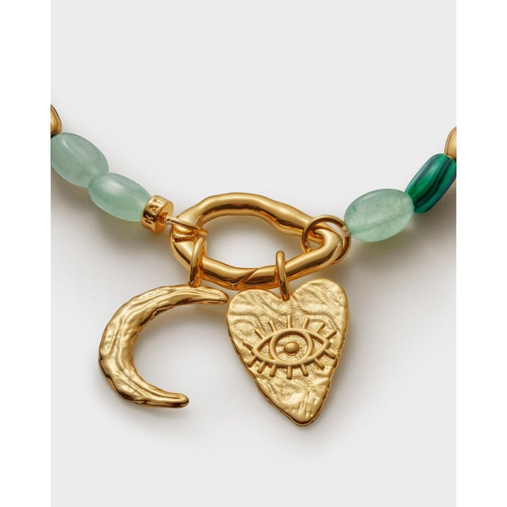 Niche Jewellery Katie Loxton Palma Solesi gold bracelet with green beads, crescent moon and evil eye charms. Waterproof.