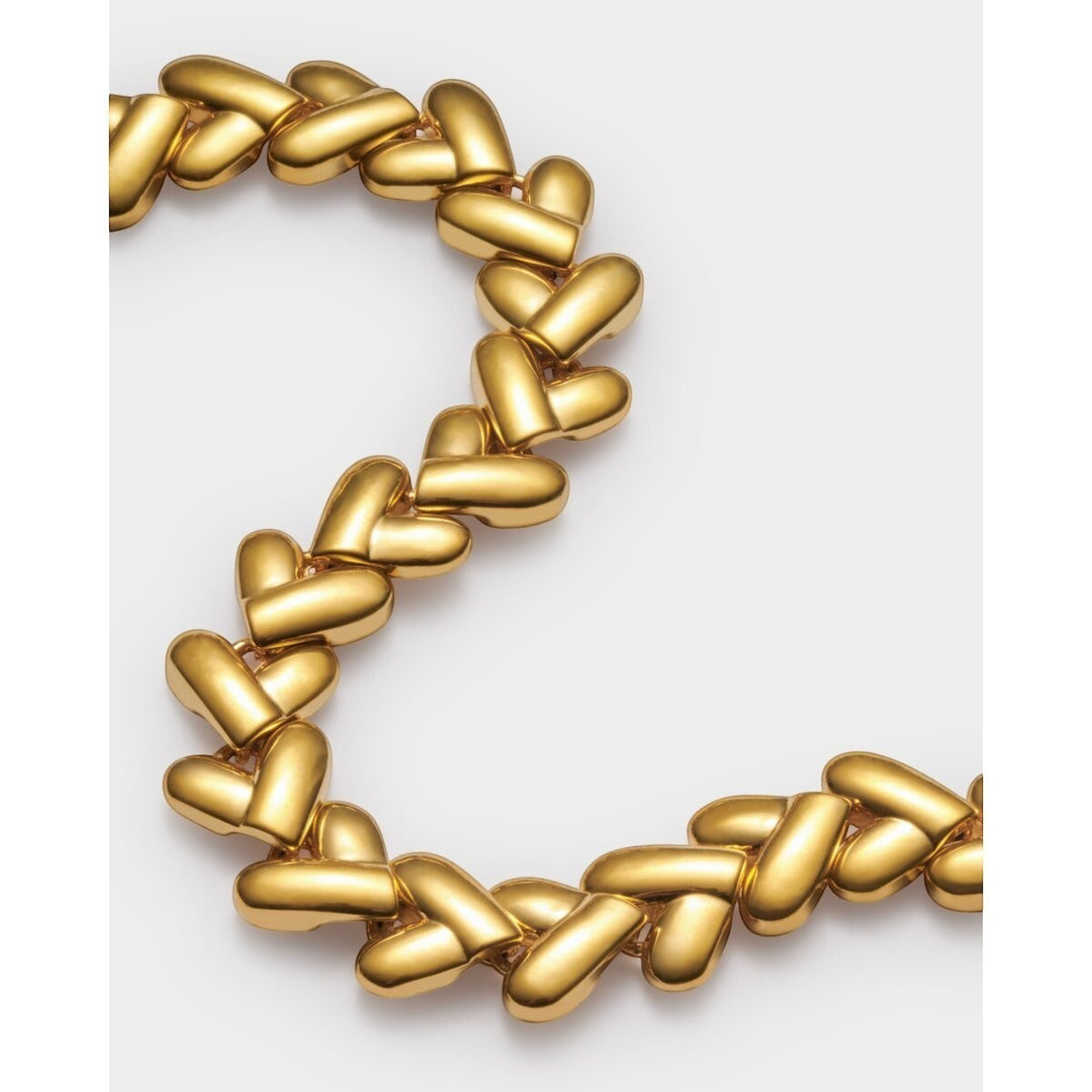 Niche Jewellery: Katie Loxton gold bracelet with interlocking heart links, adjustable chain, and lobster clasp. Waterproof 18K Gold PVD.