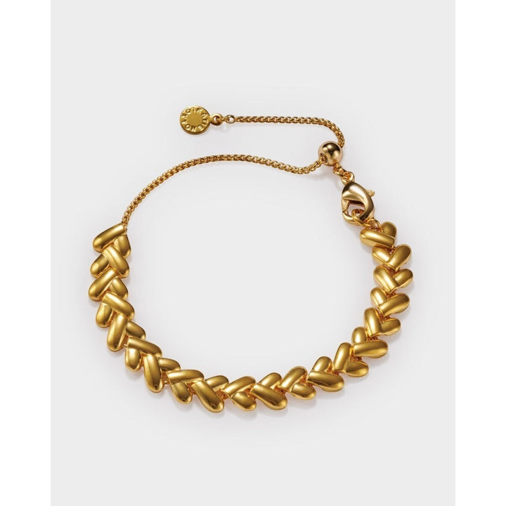 Niche Jewellery: Katie Loxton gold bracelet with interlocking heart links, adjustable chain, and lobster clasp. Waterproof 18K Gold PVD.
