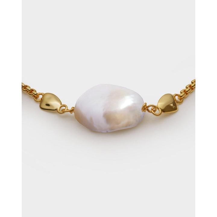 Katie Loxton Sol Pearl Waterproof Gold Anklet with freshwater pearl and gold details.