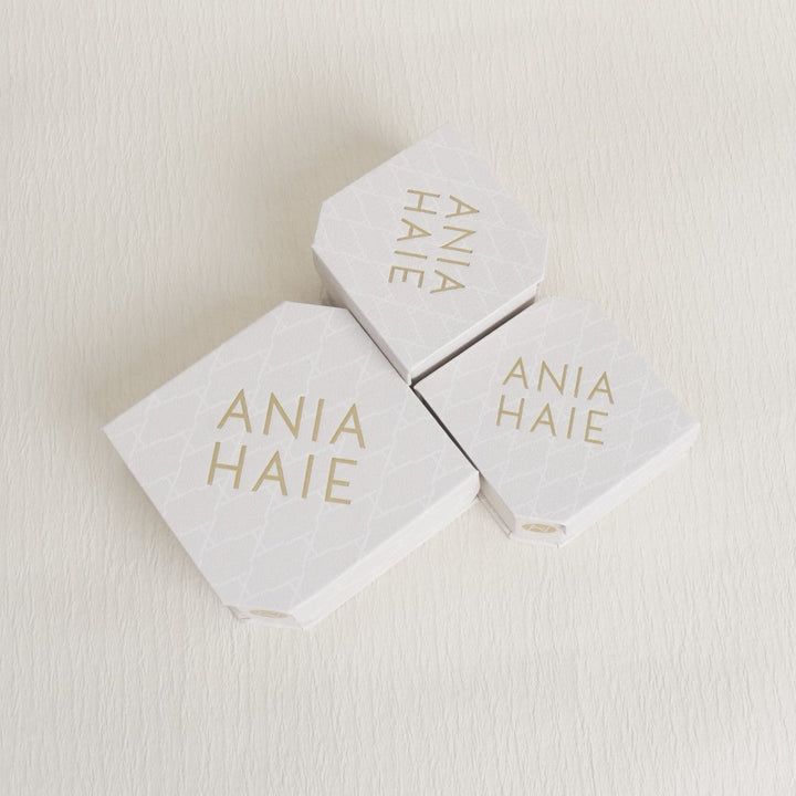 Niche Jewellery branded white hexagonal gift boxes for Ania Haie Sparkling Lucky Clover Silver Bracelet