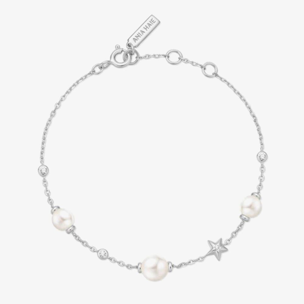 Niche Jewellery Ania Haie rhodium-plated sterling silver bracelet featuring shell pearls and a star station charm.